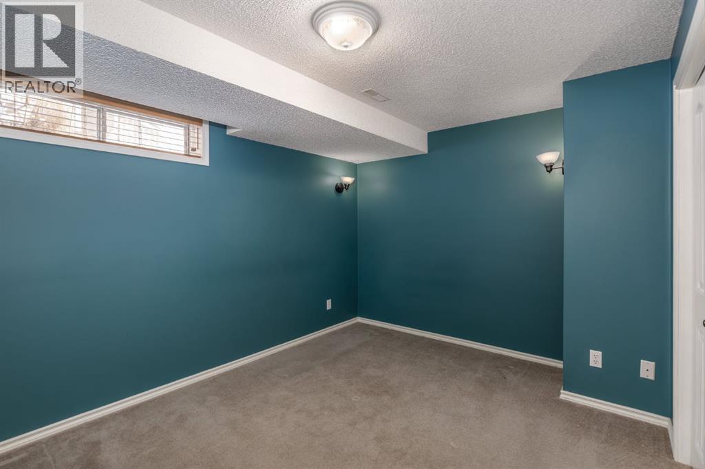 108 Quigley Close, Cochrane, Alberta  T4C 1S4 - Photo 24 - A2292444