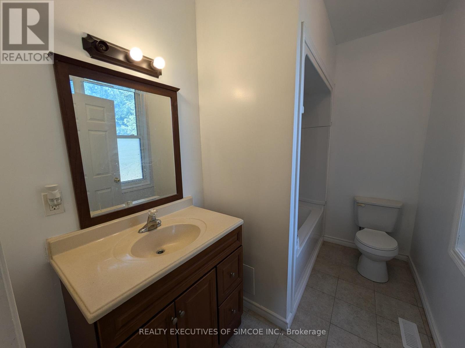 87 Maple Avenue, Barrie (City Centre), Ontario  L4N 1S1 - Photo 12 - S12947996