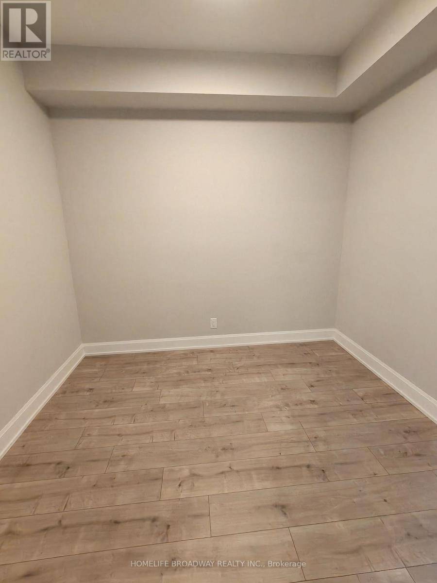 302 - 18 Water Walk Drive, Markham, Ontario  L3R 6L5 - Photo 4 - N12945166