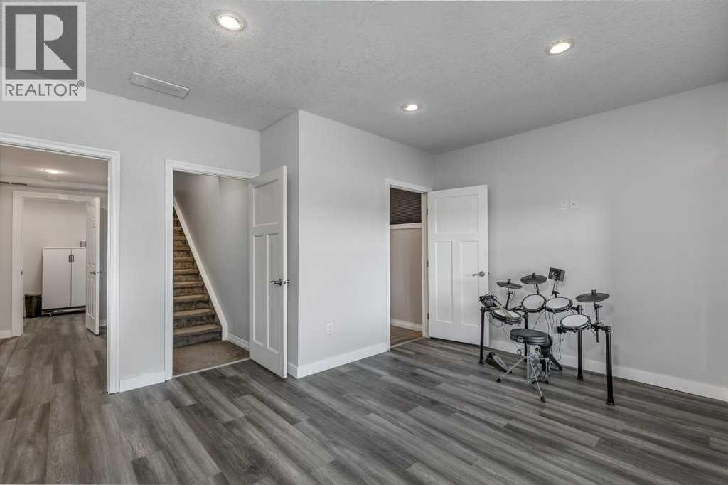 128 Sunset Park, Cochrane, Alberta  T4C 0N5 - Photo 30 - A2290294