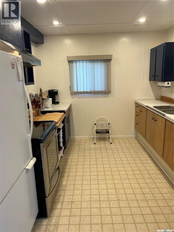 513 Tamarack Place, Northern Admin District, Saskatchewan  S0J 2J0 - Photo 6 - SK031869