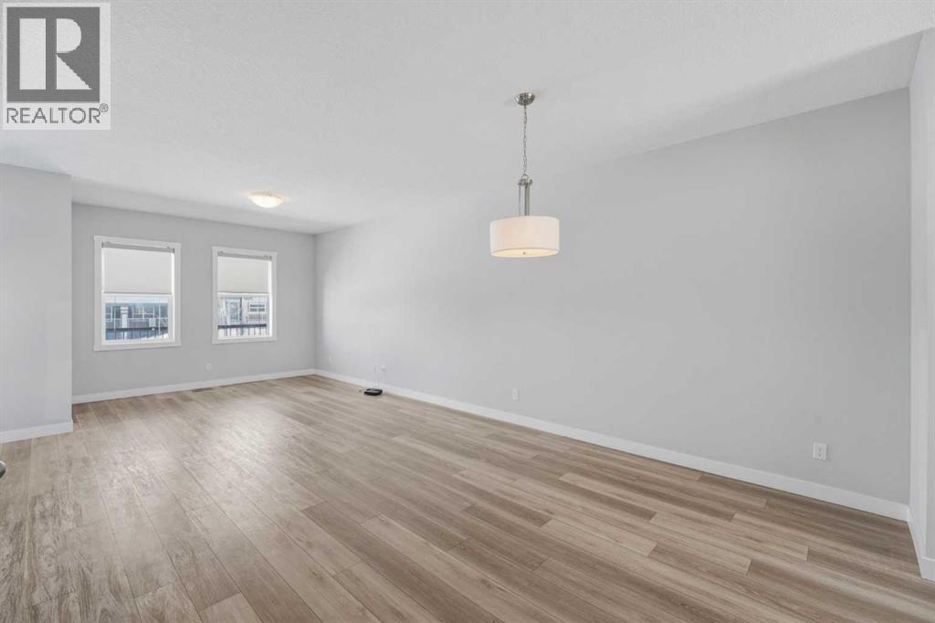 125 Edith Gate NW, Calgary, Alberta  T3R 1Z2 - Photo 6 - A2295954