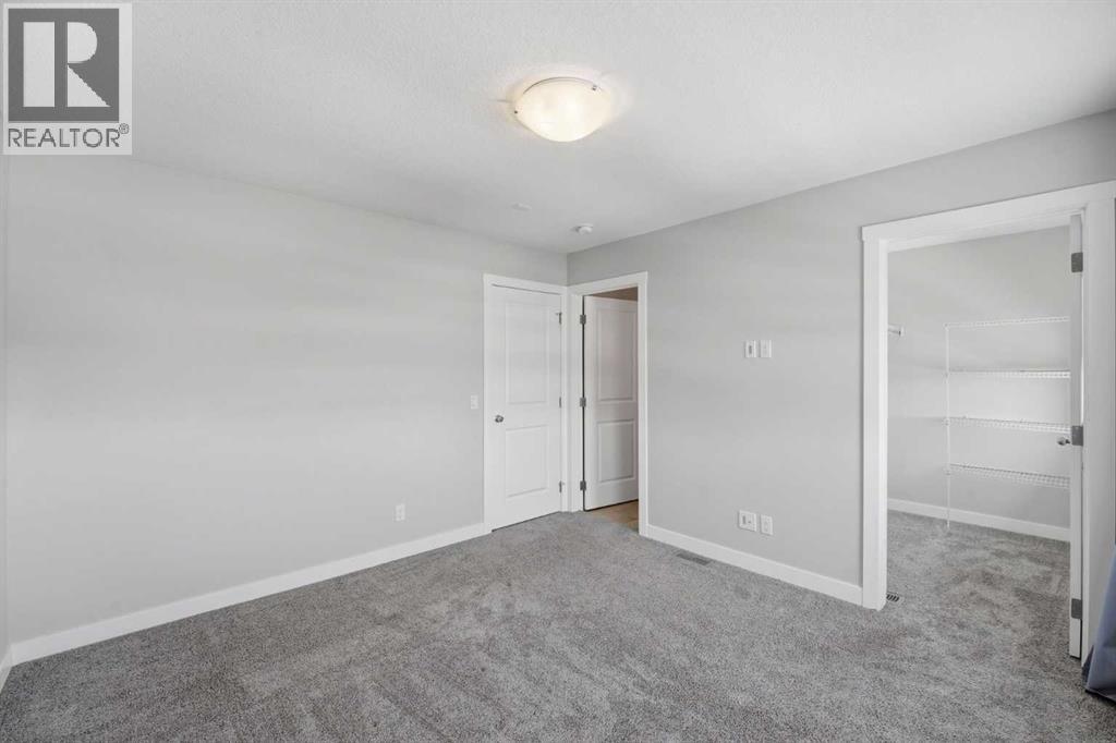 125 Edith Gate NW, Calgary, Alberta  T3R 1Z2 - Photo 23 - A2295954