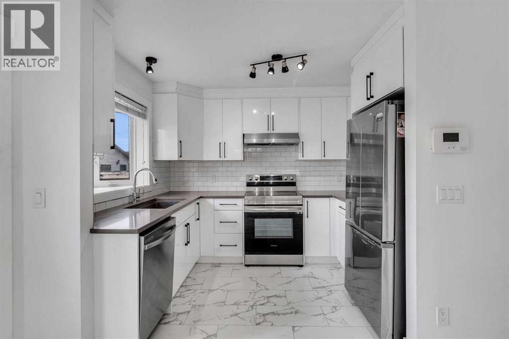 429 Taradale Drive NE, Calgary, Alberta  T3J 3X2 - Photo 10 - A2294879