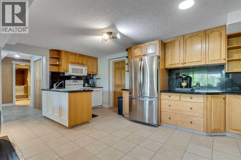 24157 Meadow Drive, Rural Rocky View County, Alberta  T3R 1A8 - Photo 30 - A2298440