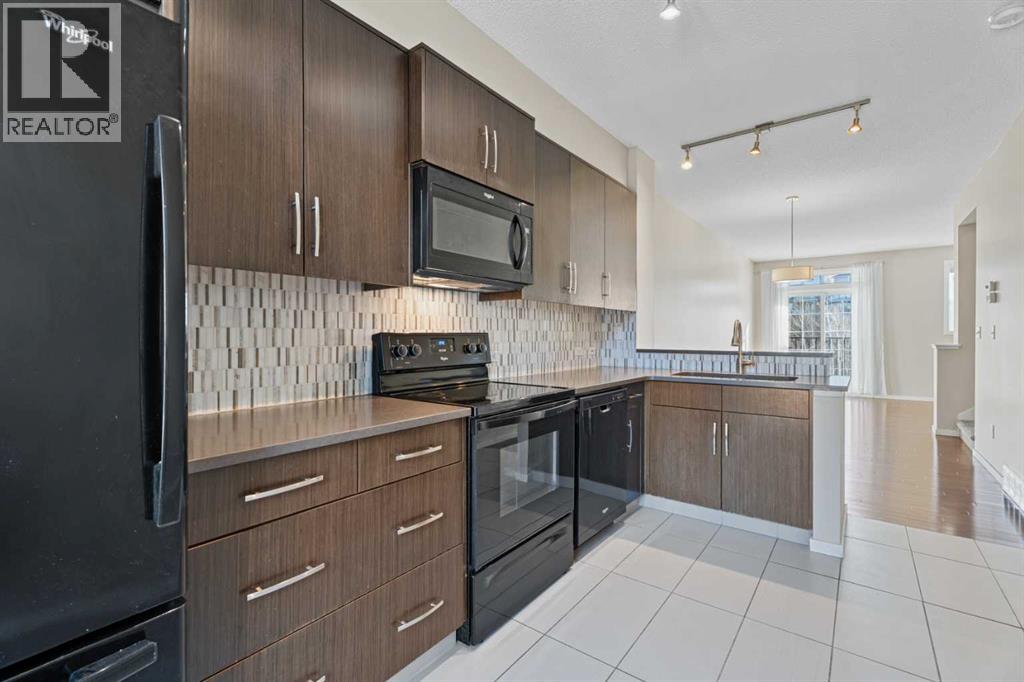 306 Ascot Circle Sw, Calgary, Alberta  T3H 0X2 - Photo 5 - A2294990