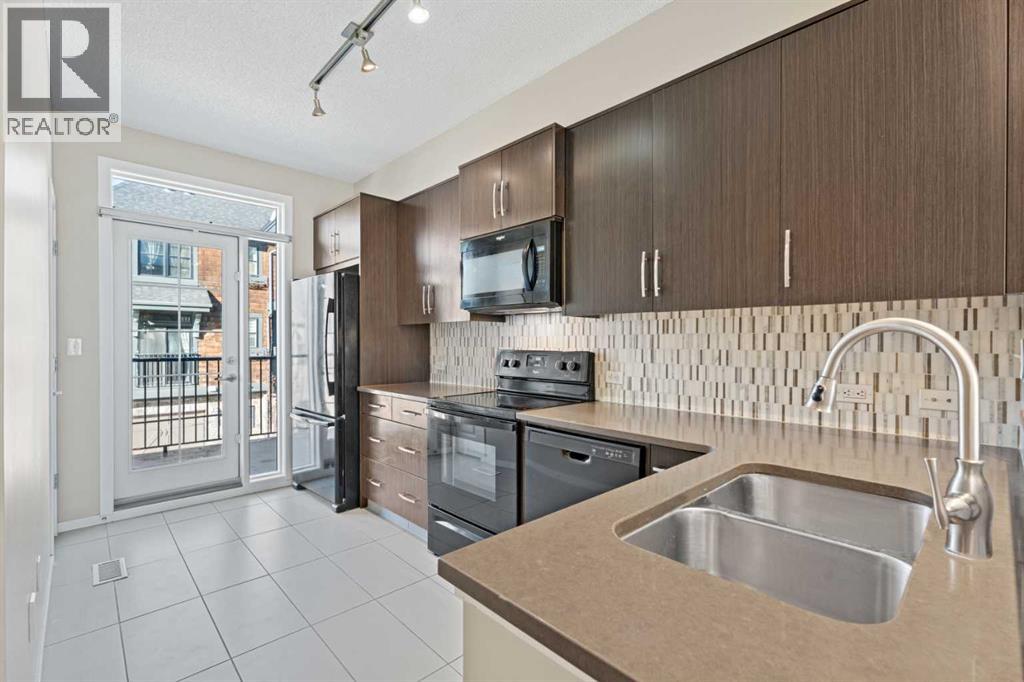 306 Ascot Circle Sw, Calgary, Alberta  T3H 0X2 - Photo 3 - A2294990