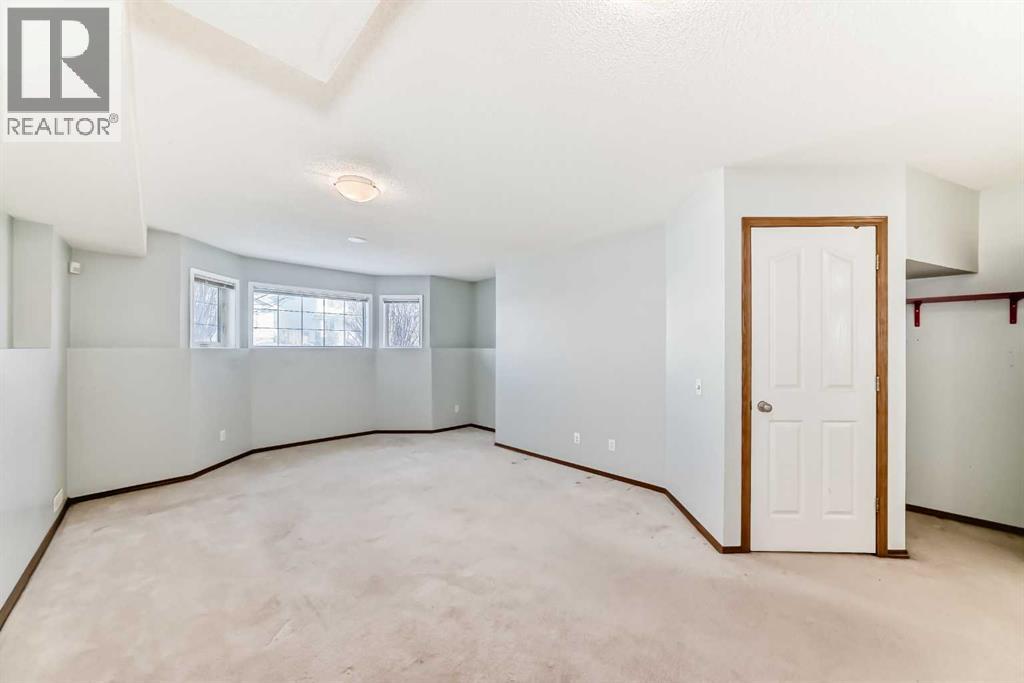 7109 Laguna Way NE, Calgary, Alberta  T1Y 7A7 - Photo 30 - A2298295