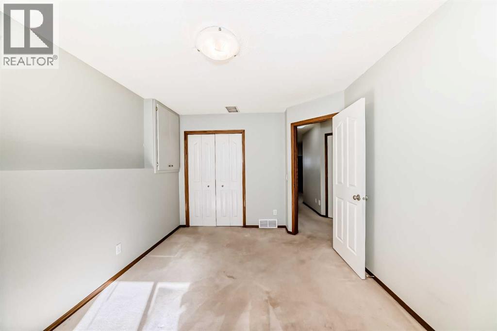 7109 Laguna Way NE, Calgary, Alberta  T1Y 7A7 - Photo 32 - A2298295