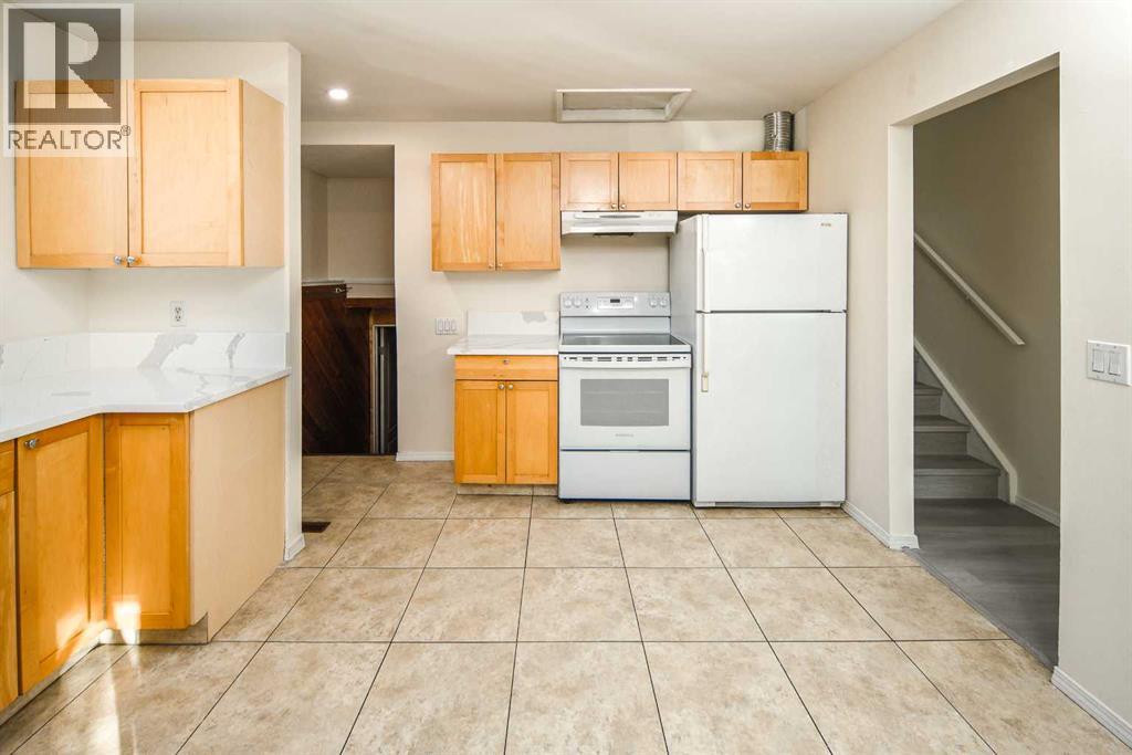 20 Bernard Way NW, Calgary, Alberta  T3K 2B9 - Photo 6 - A2293046