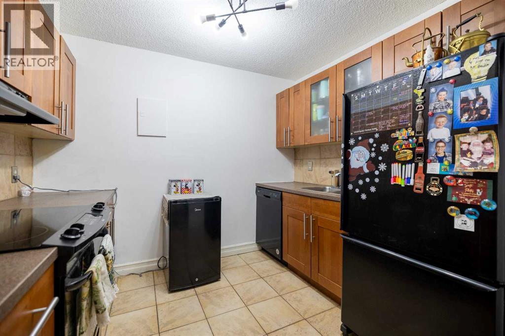 208, 4944 Dalton Drive NW, Calgary, Alberta  T3A 2E6 - Photo 9 - A2272072