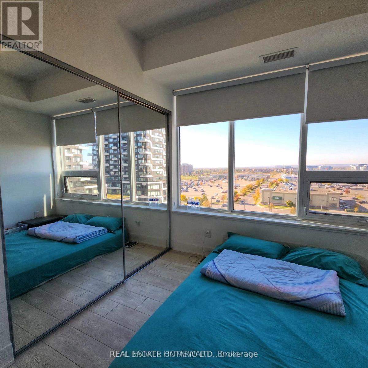 703 - 297 Oak Walk Drive, Oakville, Ontario  L6H 3R6 - Photo 11 - W12949318