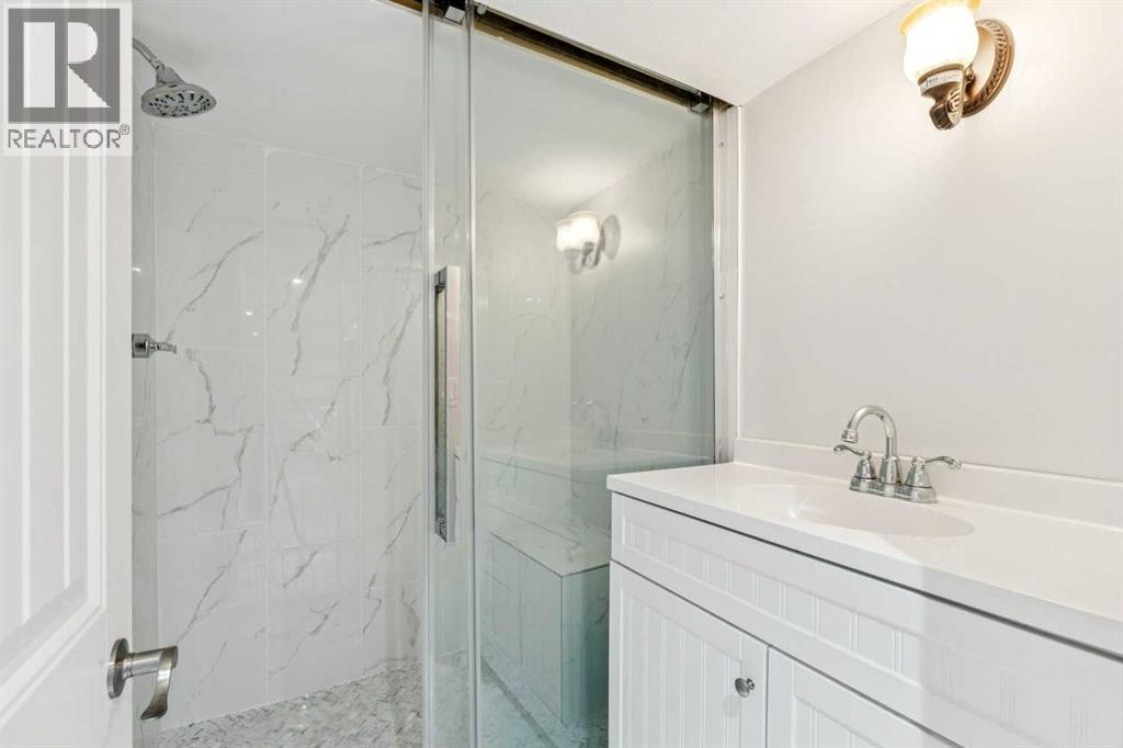 240 Cottageclub Crescent, Rural Rocky View County, Alberta T4C 1B1 - Photo 18 - A2298150