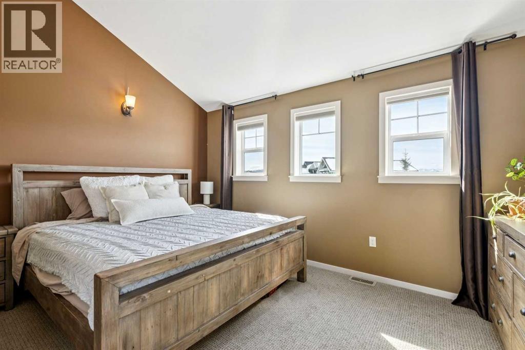 240 Cottageclub Crescent, Rural Rocky View County, Alberta T4C 1B1 - Photo 11 - A2298150