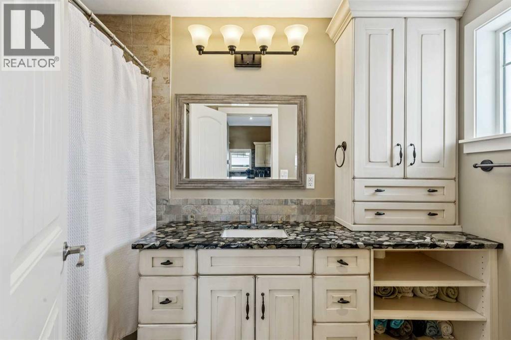 240 Cottageclub Crescent, Rural Rocky View County, Alberta T4C 1B1 - Photo 8 - A2298150