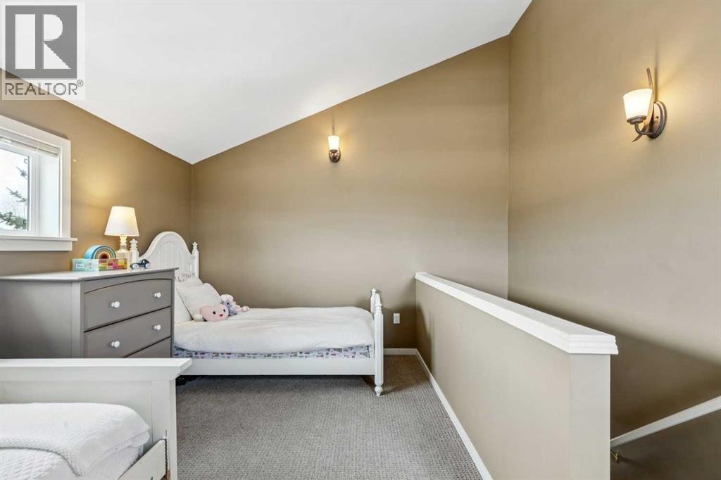 240 Cottageclub Crescent, Rural Rocky View County, Alberta T4C 1B1 - Photo 14 - A2298150