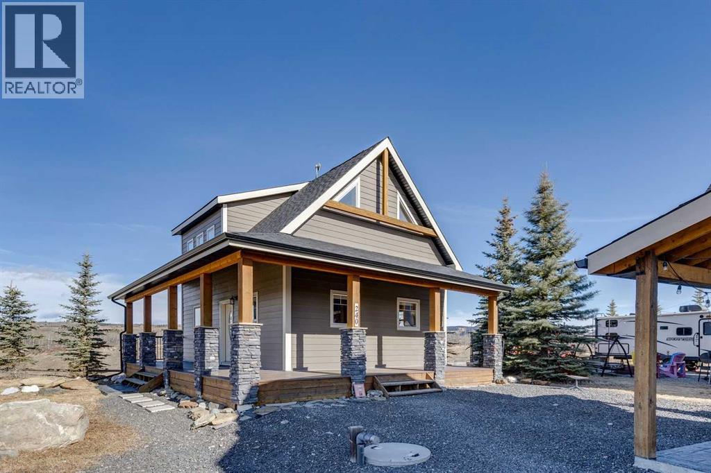 240 Cottageclub Crescent, Rural Rocky View County, Alberta T4C 1B1 - Photo 26 - A2298150