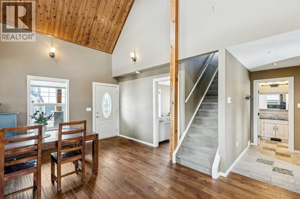 240 Cottageclub Crescent, Rural Rocky View County, Alberta T4C 1B1 - Photo 7 - A2298150