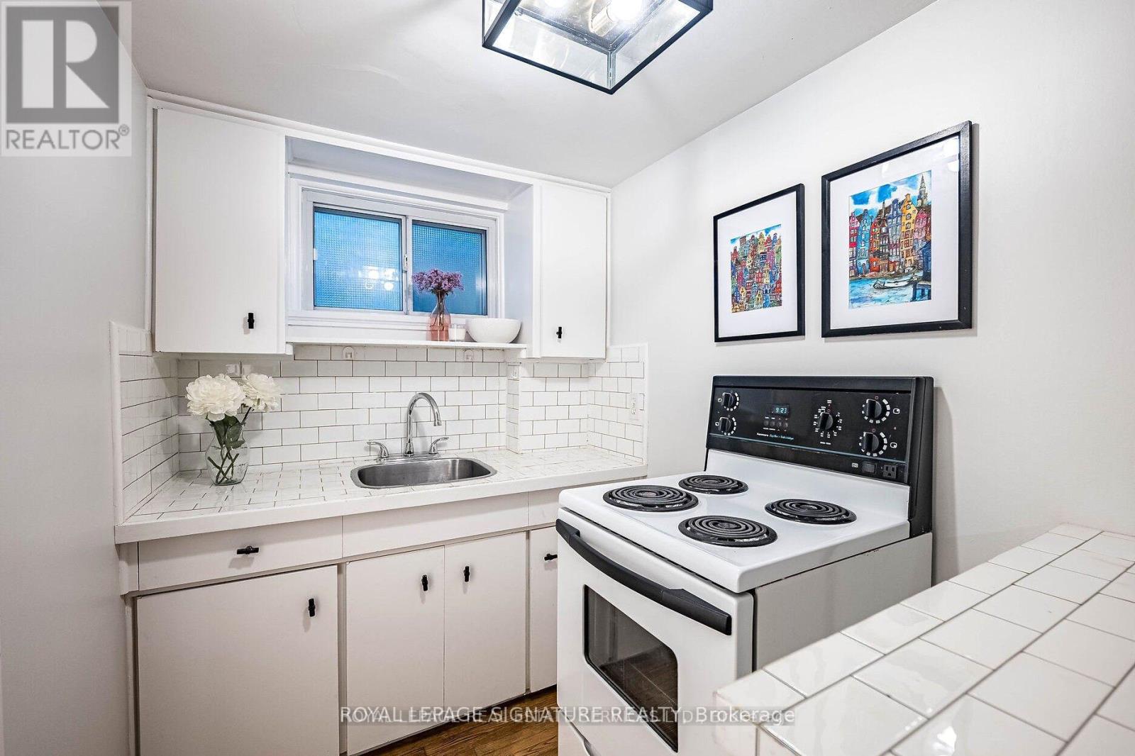 Bsmt - 6 Twelfth Street, Toronto, Ontario  M8V 3G7 - Photo 6 - W12949640