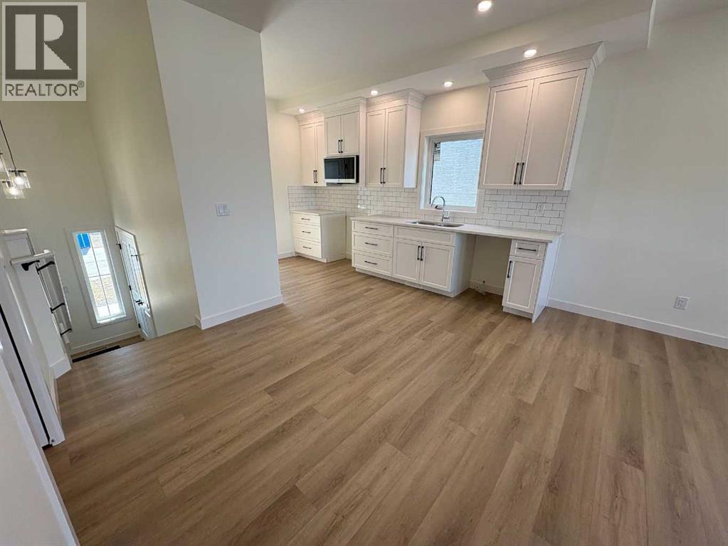 423 Meadowlark Way, Vulcan, Alberta  T0L 2B0 - Photo 4 - A2253580