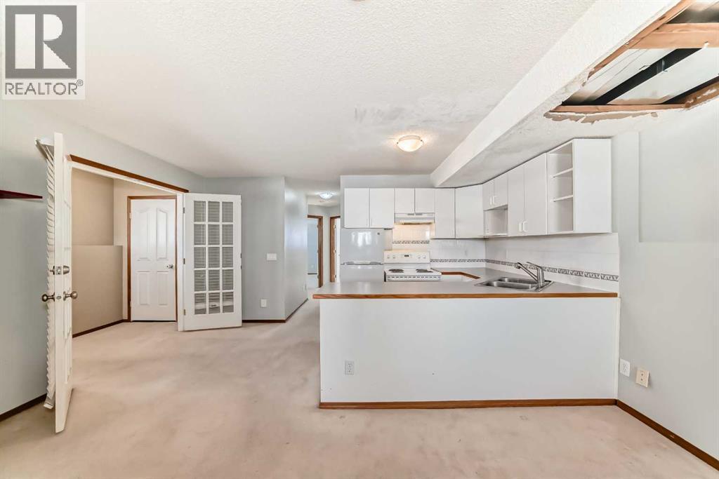 7109 Laguna Way NE, Calgary, Alberta  T1Y 7A7 - Photo 26 - A2298295