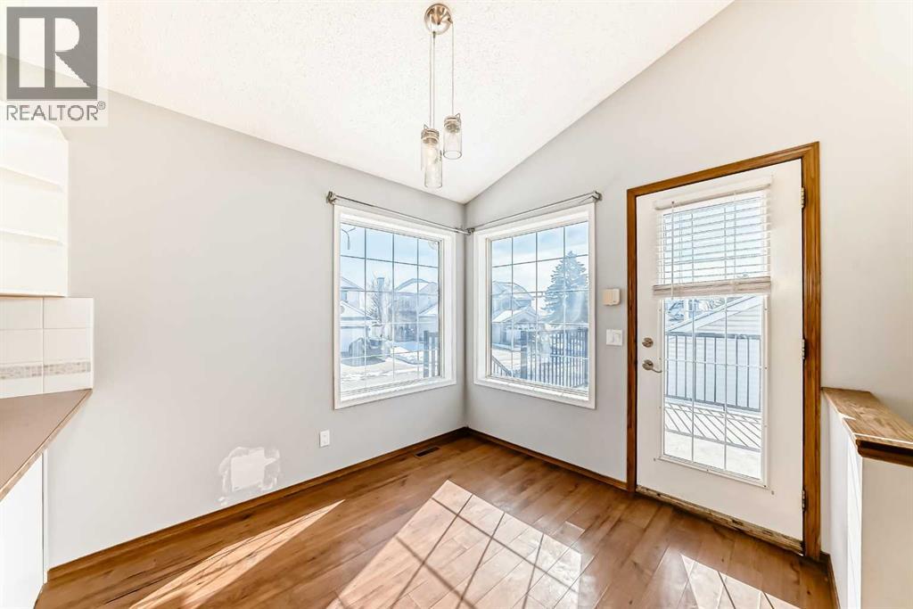 7109 Laguna Way NE, Calgary, Alberta  T1Y 7A7 - Photo 12 - A2298295