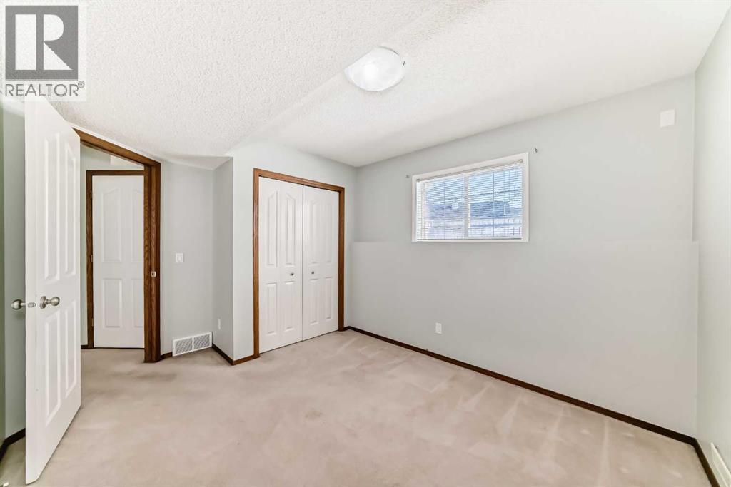 7109 Laguna Way NE, Calgary, Alberta  T1Y 7A7 - Photo 33 - A2298295