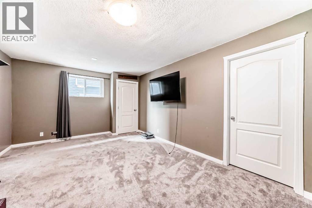 33 Boulder Creek Manor SE, Langdon, Alberta  T0J 1X3 - Photo 33 - A2291251