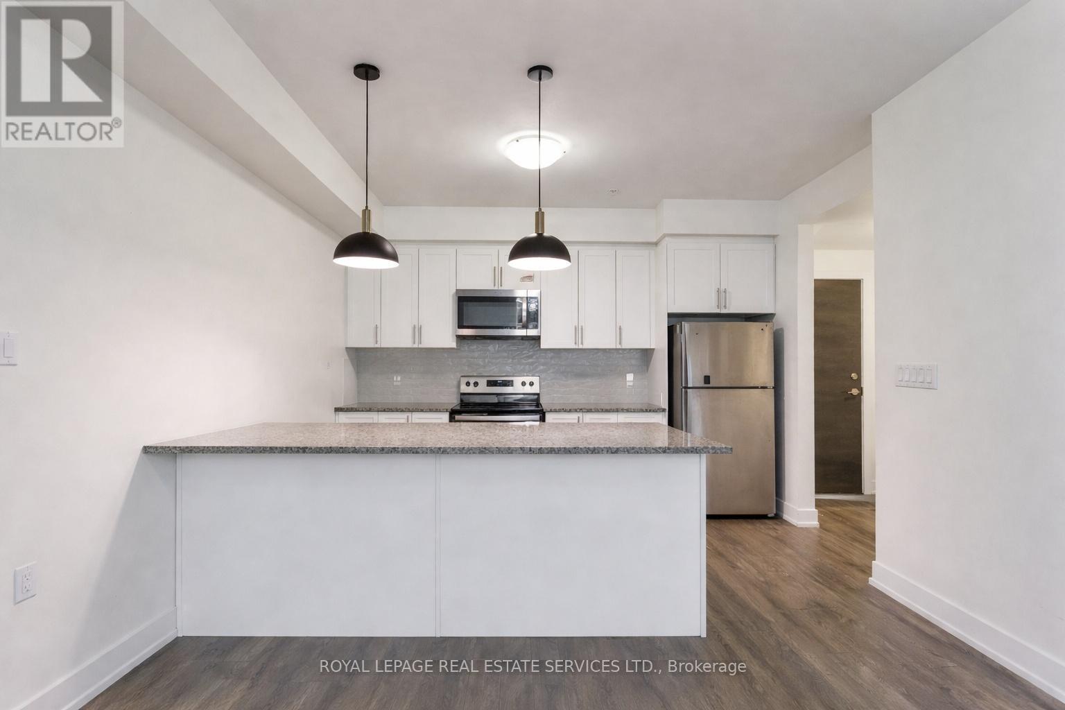 420 - 150 Oak Park Boulevard, Oakville, Ontario  L6H 3P2 - Photo 15 - W12950536