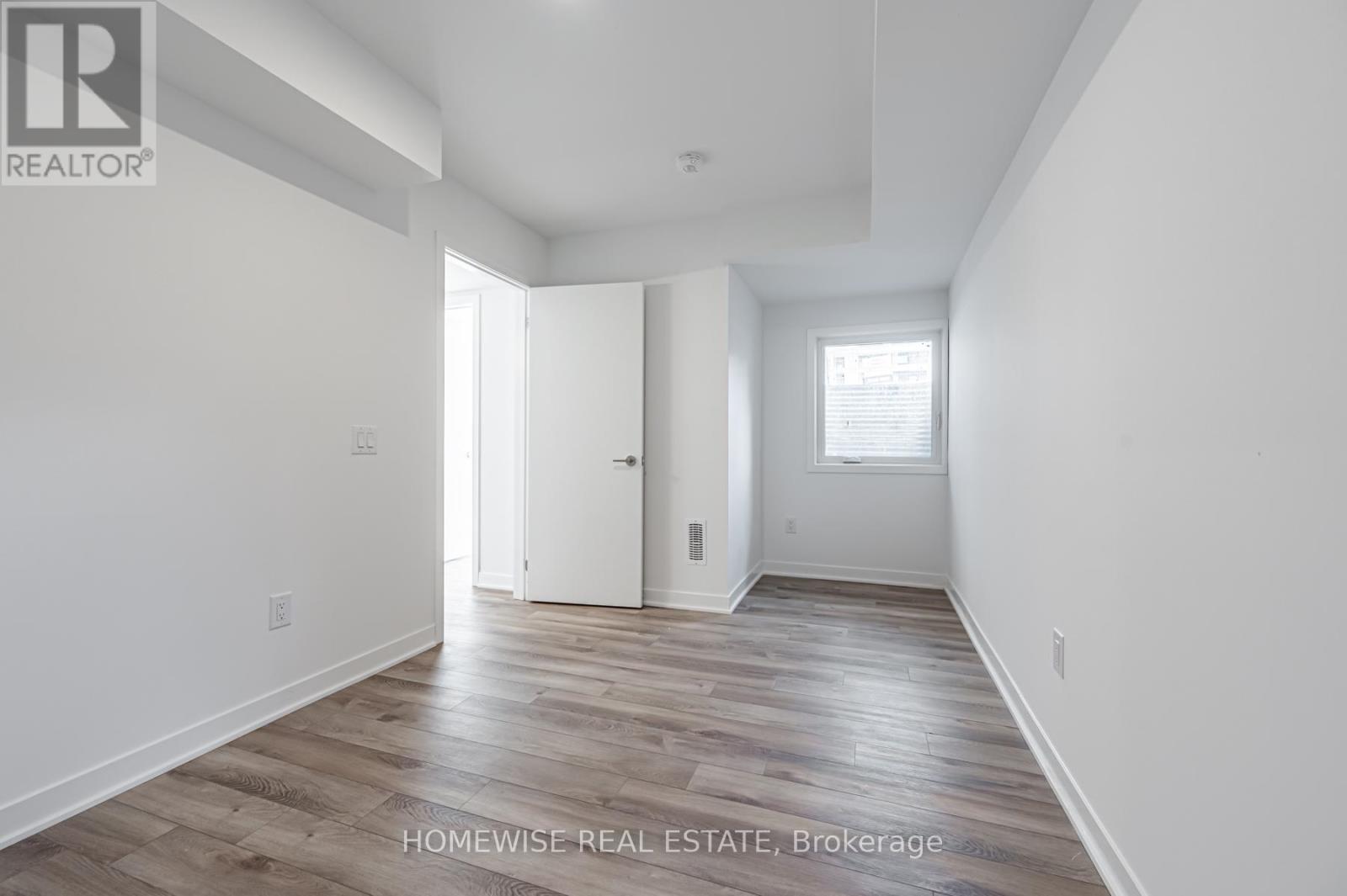 Th8 - 20 Ed Clark Gardens, Toronto, Ontario  M6N 0B5 - Photo 15 - W12950636