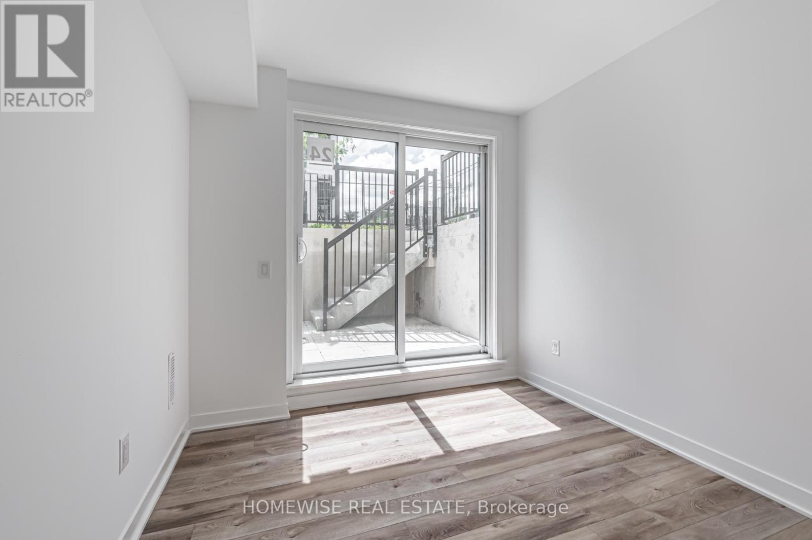 Th8 - 20 Ed Clark Gardens, Toronto, Ontario  M6N 0B5 - Photo 17 - W12950636