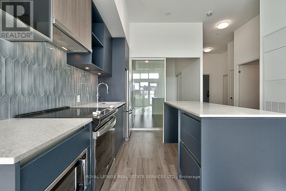 101 - 405 Dundas Street W, Oakville, Ontario  L6M 5P4 - Photo 6 - W12950652