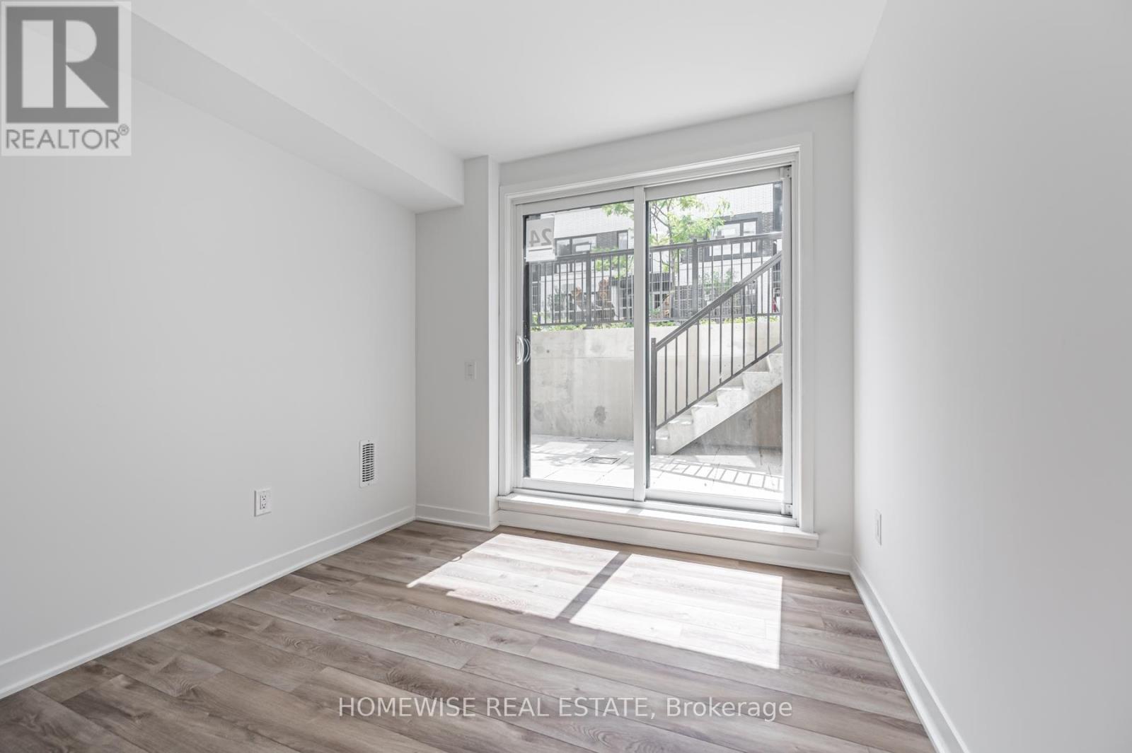 Th8 - 20 Ed Clark Gardens, Toronto, Ontario  M6N 0B5 - Photo 19 - W12950676