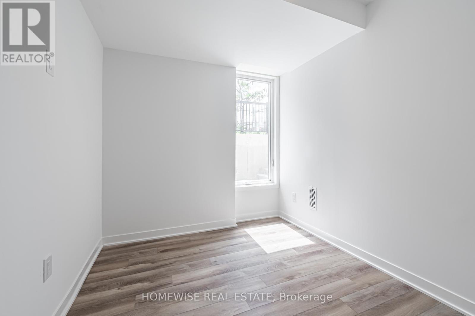 Th8 - 20 Ed Clark Gardens, Toronto, Ontario  M6N 0B5 - Photo 20 - W12950676