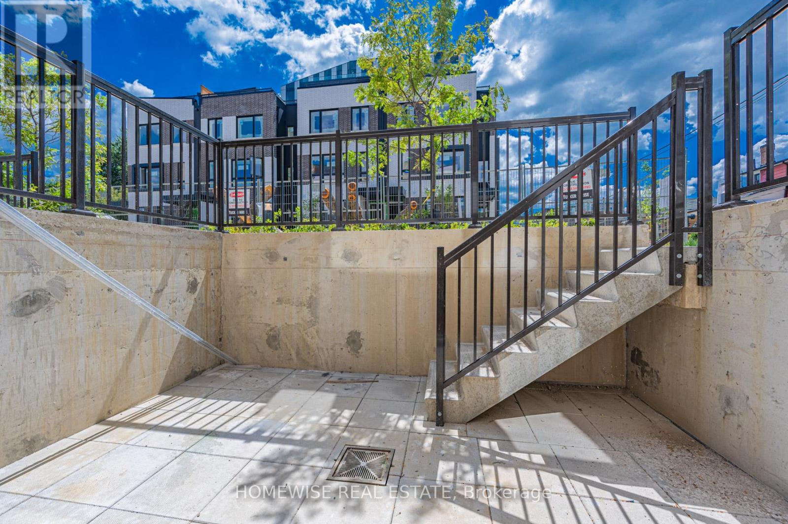 Th8 - 20 Ed Clark Gardens, Toronto, Ontario  M6N 0B5 - Photo 23 - W12950676