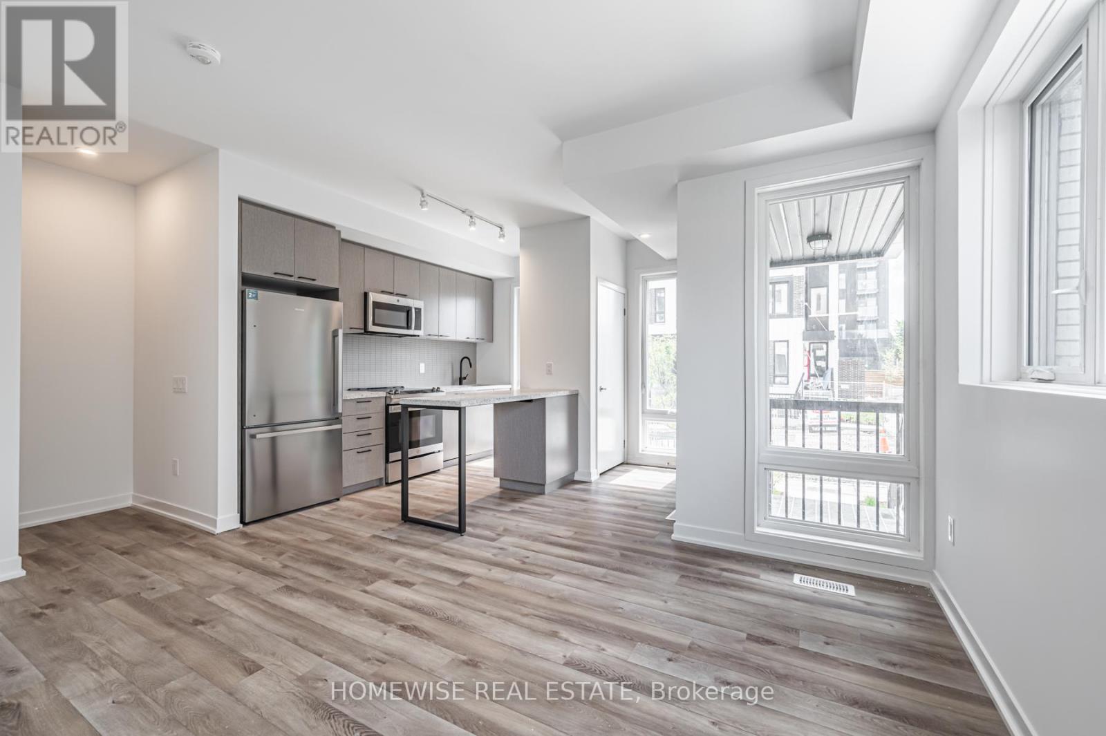 Th8 - 20 Ed Clark Gardens, Toronto, Ontario  M6N 0B5 - Photo 8 - W12950676