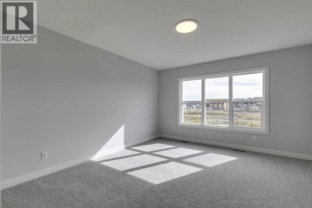 31 Creekstone Green Sw, Calgary, Alberta  T2X 6H6 - Photo 26 - A2284189