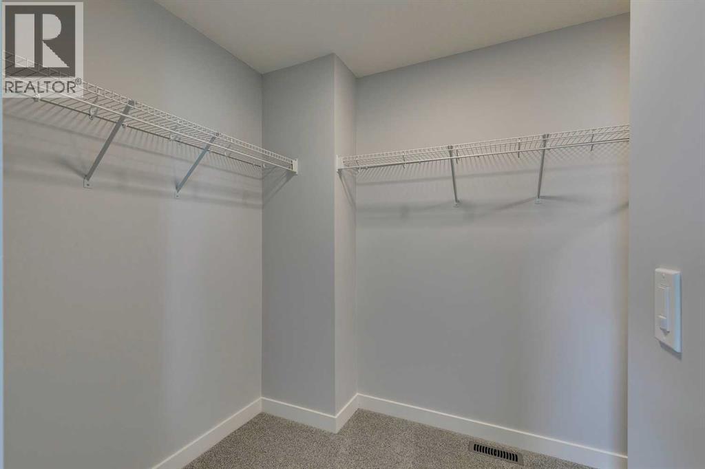 31 Creekstone Green Sw, Calgary, Alberta  T2X 6H6 - Photo 33 - A2284189