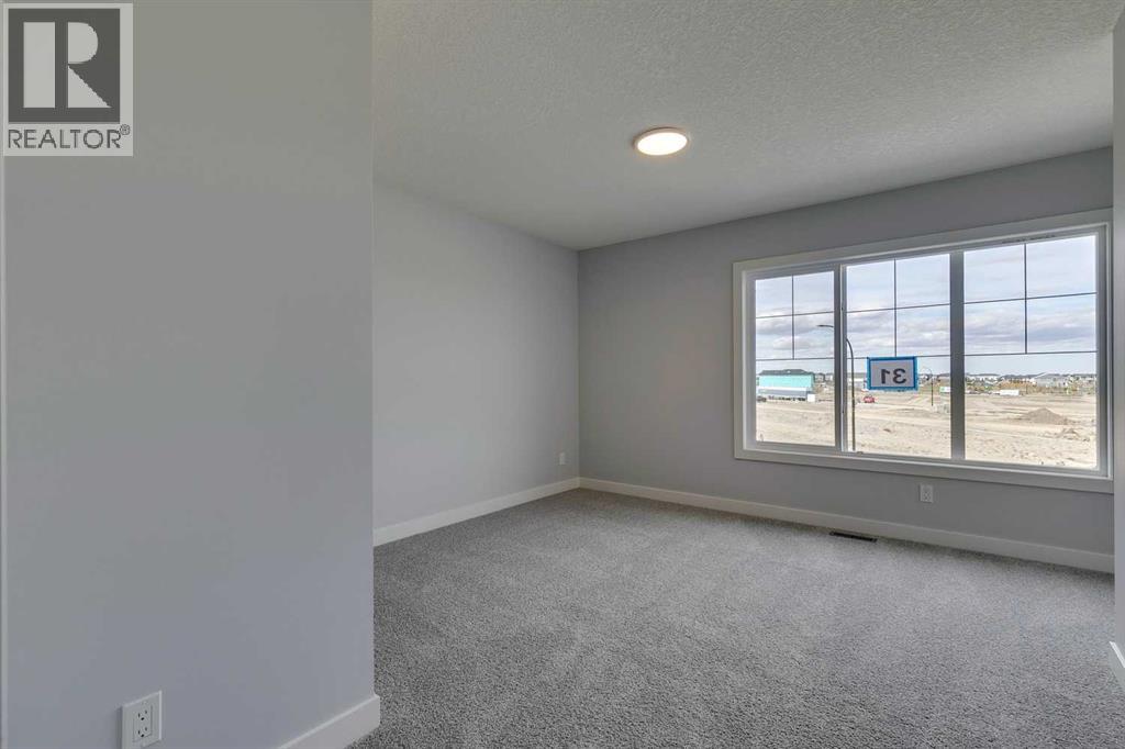 31 Creekstone Green Sw, Calgary, Alberta  T2X 6H6 - Photo 25 - A2284189