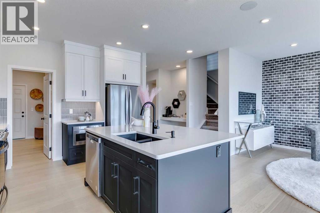 23 Belmont Place SW, Calgary, Alberta  T2X 5T6 - Photo 5 - A2288283