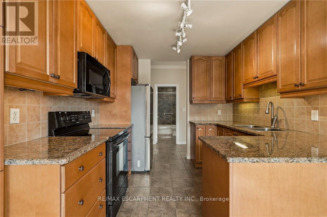 703 - 4000 Creekside Drive, Hamilton, Ontario  L9H 7S9 - Photo 11 - X12950836