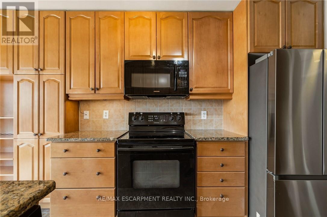 703 - 4000 Creekside Drive, Hamilton, Ontario  L9H 7S9 - Photo 9 - X12950836