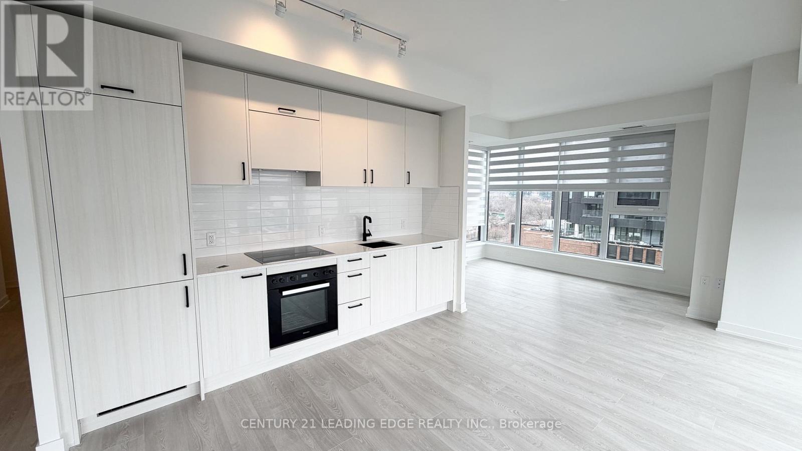703 - 5 Quarrington Lane, Toronto, Ontario  M3C 1H7 - Photo 2 - C12904558
