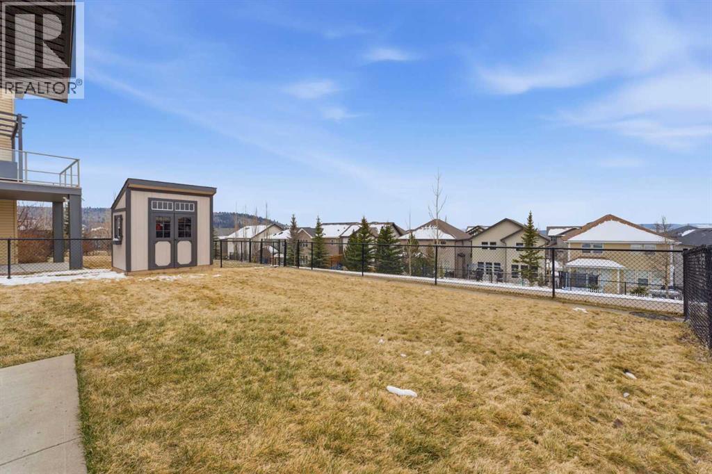 95 Sunset Way, Cochrane, Alberta  T4C 0G2 - Photo 37 - A2297049