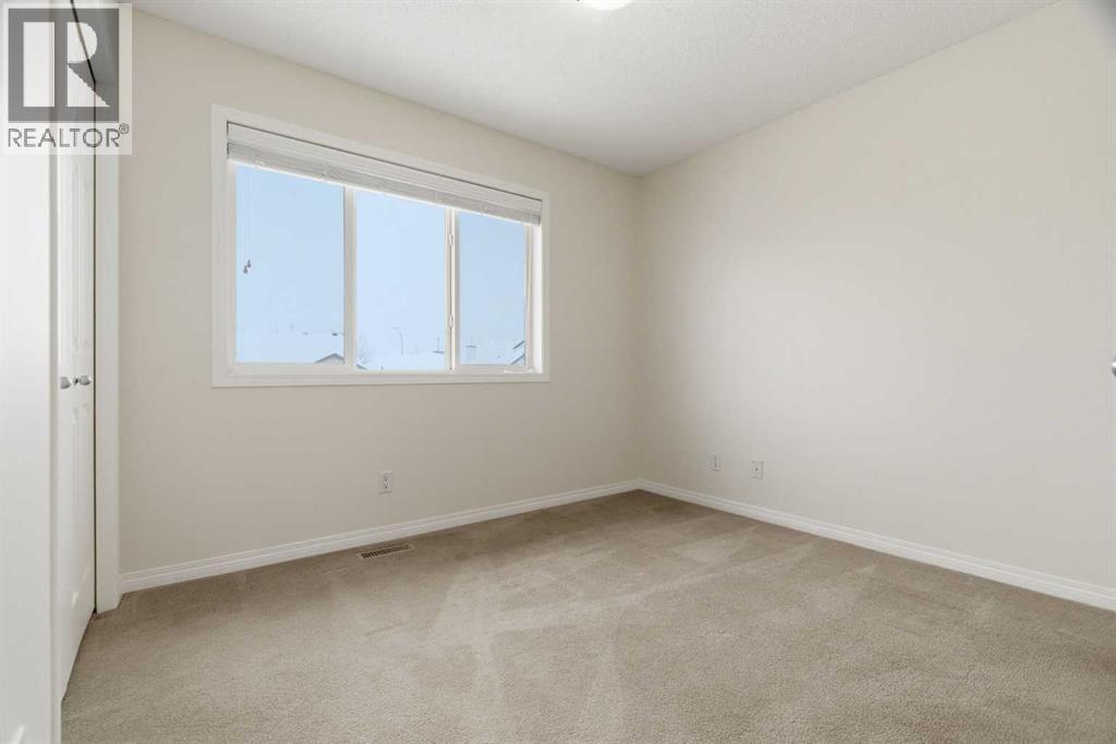 107 Cimarron Grove Circle, Okotoks, Alberta  T1S 2L9 - Photo 27 - A2294347
