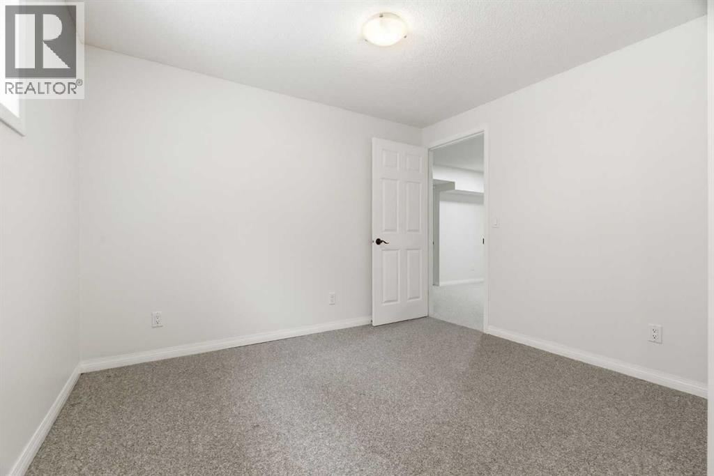 107 Cimarron Grove Circle, Okotoks, Alberta  T1S 2L9 - Photo 34 - A2294347