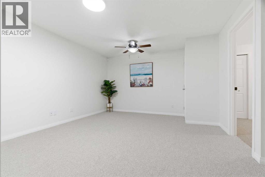 107 Cimarron Grove Circle, Okotoks, Alberta  T1S 2L9 - Photo 36 - A2294347