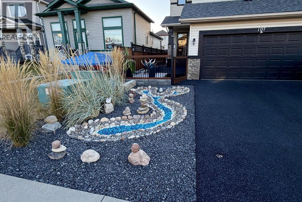 107 Cimarron Grove Circle, Okotoks, Alberta  T1S 2L9 - Photo 43 - A2294347