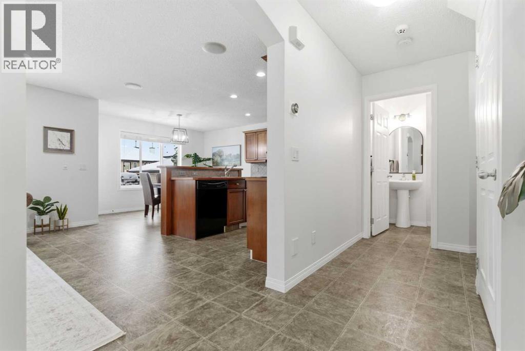 107 Cimarron Grove Circle, Okotoks, Alberta  T1S 2L9 - Photo 7 - A2294347