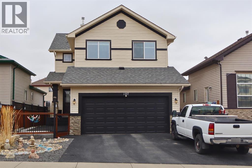 107 Cimarron Grove Circle, Okotoks, Alberta  T1S 2L9 - Photo 2 - A2294347